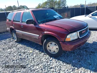 2001 GMC Jimmy SL with VIN 1GKCS13W012143344, listed as a IAAI auction lot 41385552 with 216,127 mi miles. Bid and sale history available at carsss.com. Image 1.