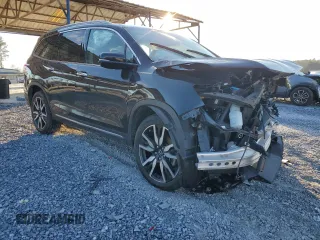 2020 Honda Pilot Touring 8-Passenger with VIN 5FNYF6H96LB012456, listed as a Copart auction lot 87736855 with 43,147 mi miles and Salvage Title. Bid and sale history available at DreamBid. Image 4.
