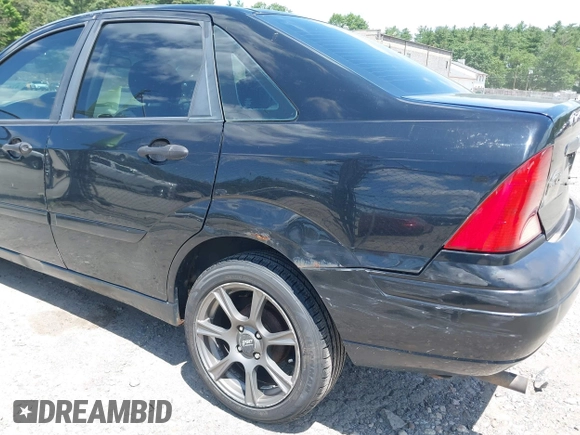 2004 Ford Focus SE z VIN 1FAFP34Z54W175689, wystawiony jako IAAI lot #42553615 z przebiegiem 188 652 mil mil oraz . Historia ofert i sprzedaży dostępna na DreamBid. Obrazek 6.