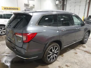 2019 Honda Pilot Touring 7-Passenger с VIN 5FNYF6H68KB082089, выставлен на аукционе IAAI как лот 42616148 с пробегом 69 913 миль миль и . История ставок и продаж доступна на DreamBid. Изображение 4.
