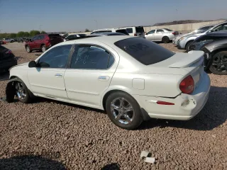2001 Nissan Maxima GXE z VIN JN1CA31D71T827204, wystawiony jako Copart lot #71219104 z przebiegiem 195 343 mil mil oraz Szkoda całkowita • Salvage title. Historia ofert i sprzedaży dostępna na DreamBid. Obrazek 2.