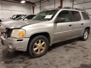 2005 GMC Envoy SLE with VIN 1GKET16S656102522, listed as a IAAI auction lot 41729310 with 233,049 mi miles. Bid and sale history available at carsss.com. Image 21.