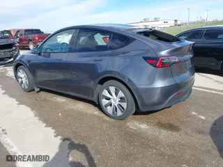 2023 Tesla Model Y Long Range with VIN 7SAYGDEE3PA204992, listed as a IAAI auction lot 41849104 with 22,490 mi miles. Bid and sale history available at carsss.com. Image 3.