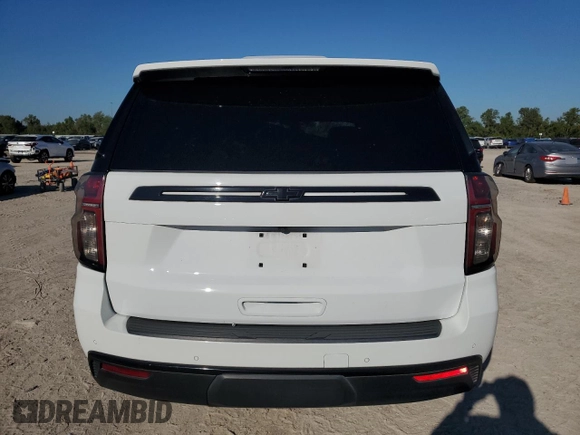 2021 Chevrolet Tahoe LS with VIN 1GNSCMKD5MR293121, listed as a Copart auction lot 73419424 with 75,657 mi miles and Salvage title. Bid and sale history available at DreamBid. Image 6.