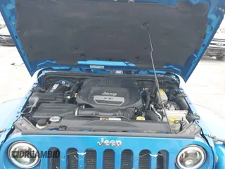 2014 Jeep Wrangler Arctic z VIN 1C4GJWBG3EL313350, wystawiony jako IAAI lot #41442520 z przebiegiem Nie podano mil oraz . Historia ofert i sprzedaży dostępna na DreamBid. Obrazek 10.