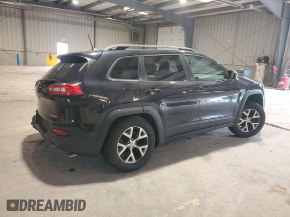 2016 Jeep Cherokee Trailhawk with VIN 1C4PJMBS4GW267375, listed as a Copart auction lot 58476005 with 116,151 mi miles and Salvage title. Bid and sale history available at DreamBid. Image 3.