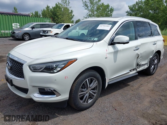 2020 Infiniti QX60 Luxe with VIN 5N1DL0MM2LC506031, listed as a IAAI auction lot 42701561 with 31,424 mi miles and . Bid and sale history available at DreamBid. Image 2.