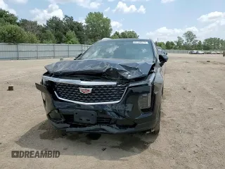2024 Cadillac XT4 AWD Premium Luxury с VIN 1GYFZDR45RF222258, выставлен на аукционе Copart как лот 61138515 с пробегом 10 021 миль миль и Списание • Salvage title. История ставок и продаж доступна на DreamBid. Изображение 13.