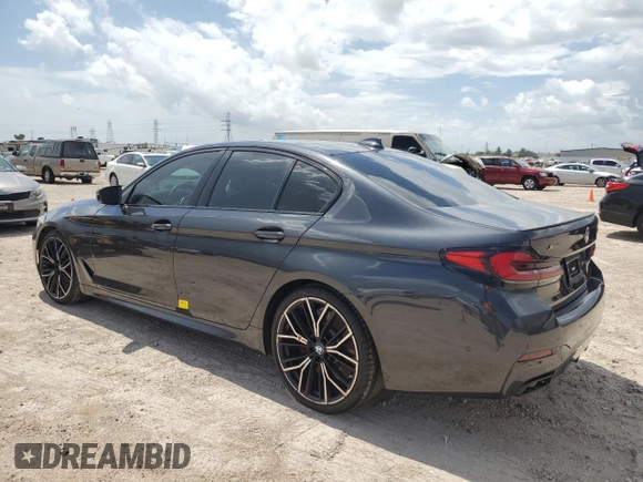 2022 BMW 5 Series M550i xDrive z VIN WBA13BK09NCJ00508, wystawiony jako Copart lot #58077634 z przebiegiem Nie podano mil oraz . Historia ofert i sprzedaży dostępna na DreamBid. Obrazek 2.