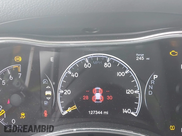 2018 Jeep Grand Cherokee Laredo E with VIN 1C4RJFAG1JC499457, listed as a IAAI auction lot 41379459 with 127,344 mi miles and . Bid and sale history available at DreamBid. Image 16.