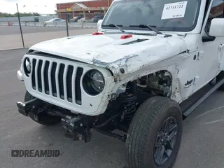 2022 Jeep Wrangler Unlimited Sahara with VIN 1C4HJXEN9NW190351, listed as a IAAI auction lot 42741722 with 40,794 mi miles and . Bid and sale history available at DreamBid. Image 6.