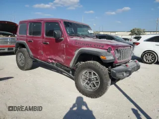 2024 Jeep Wrangler Rubicon with VIN 1C4PJXFG9RW346079, listed as a Copart auction lot 77006914 with 2,446 mi miles and Salvage Title. Bid and sale history available at DreamBid. Image 4.