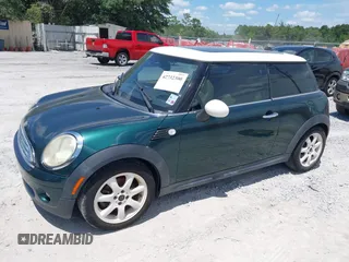 2010 MINI Hardtop with VIN WMWMF3C5XATZ23107, listed as a IAAI auction lot 42732300 with 100,747 mi miles and . Bid and sale history available at DreamBid. Image 2.