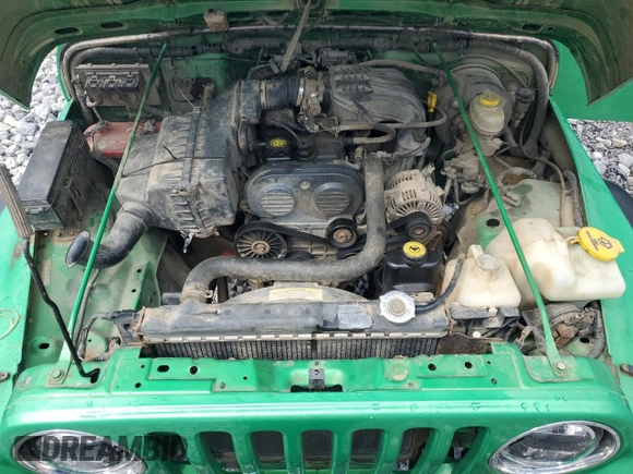2004 Jeep Wrangler SE with VIN 1J4FA29124P769475, listed as a Copart auction lot 64371244 with 136,877 mi miles and Salvage title. Bid and sale history available at DreamBid. Image 13.