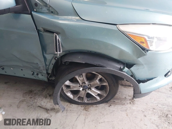 2013 Ford Escape SE with VIN 1FMCU0GX6DUC09872, listed as a IAAI auction lot 42020093 with 215,906 mi miles and . Bid and sale history available at DreamBid. Image 6.