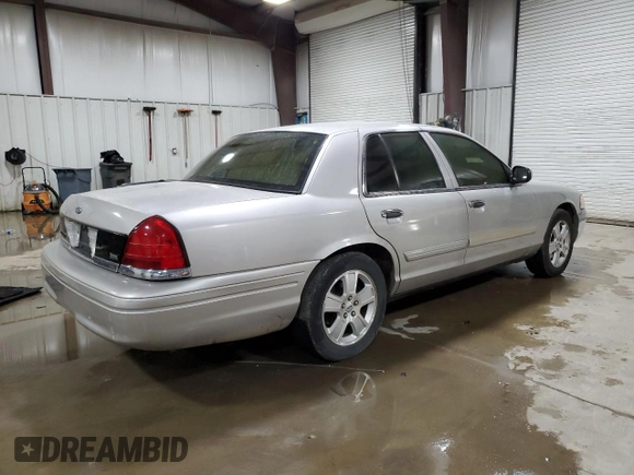 2011 Ford Crown Victoria LX z VIN 2FABP7EV0BX127312, wystawiony jako Copart lot #48760735 z przebiegiem 109 227 mil mil oraz Szkoda całkowita • Salvage title. Historia ofert i sprzedaży dostępna na DreamBid. Obrazek 3.