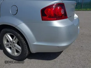 2012 Dodge Avenger SXT with VIN 1C3CDZCB4CN272422, listed as a IAAI auction lot 42122832 with 160,331 mi miles and . Bid and sale history available at carsss.com. Image 6.
