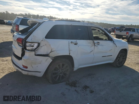 2018 Jeep Grand Cherokee High Altitude with VIN 1C4RJECG1JC125602, listed as a Copart auction lot 88702275 with 59,701 mi miles and Salvage title. Bid and sale history available at DreamBid. Image 3.