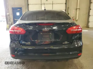 2015 Ford Focus SE z VIN 1FADP3F29FL255928, wystawiony jako Copart lot #72643654 z przebiegiem 189 984 mil mil oraz Szkoda całkowita • Salvage title. Historia ofert i sprzedaży dostępna na DreamBid. Obrazek 6.