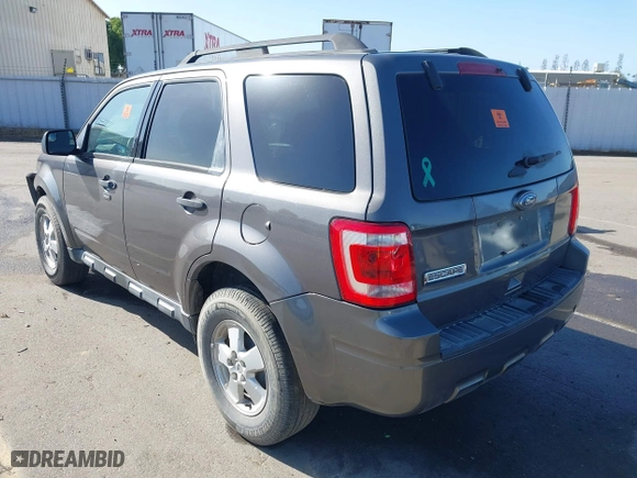2012 Ford Escape XLT with VIN 1FMCU0D78CKC45514, listed as a IAAI auction lot 41937043 with 162,601 mi miles. Bid and sale history available at carsss.com. Image 3.