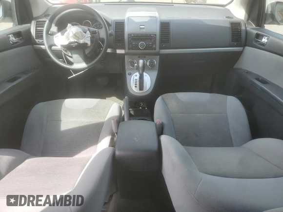 2010 Nissan Sentra S with VIN 3N1AB6AP1AL661282, listed as a Copart auction lot 56645605 with 128,504 mi miles and Salvage title. Bid and sale history available at DreamBid. Image 8.