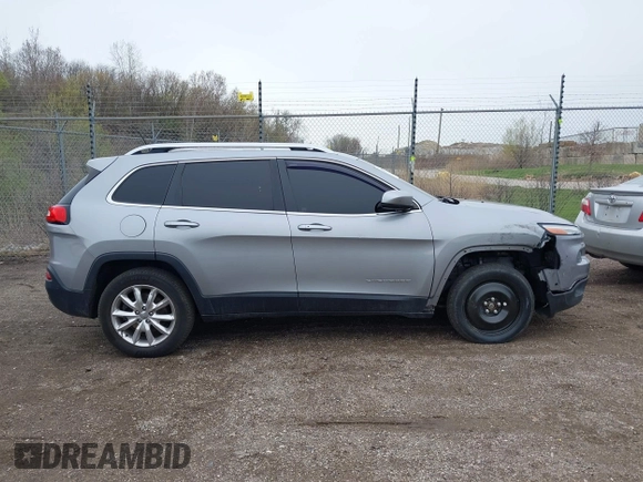 2014 Jeep Cherokee Limited z VIN 1C4PJMDB7EW197154, wystawiony jako IAAI lot #42079118 z przebiegiem 153 300 mil mil oraz . Historia ofert i sprzedaży dostępna na DreamBid. Obrazek 13.