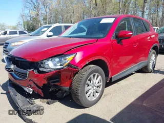 2016 Mazda CX-5 Sport with VIN JM3KE4BY7G0805631, listed as a IAAI auction lot 42028606 with 93,659 mi miles and . Bid and sale history available at carsss.com. Image 17.
