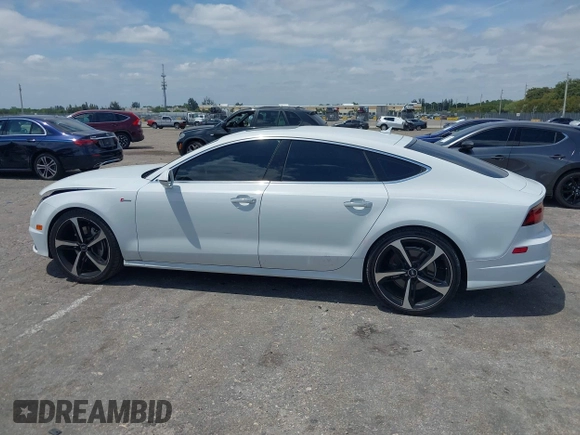 2016 Audi A7 3.0 Prestige with VIN WAU2GAFCXGN102993, listed as a IAAI auction lot 42099259 with 64,490 mi miles. Bid and sale history available at carsss.com. Image 14.