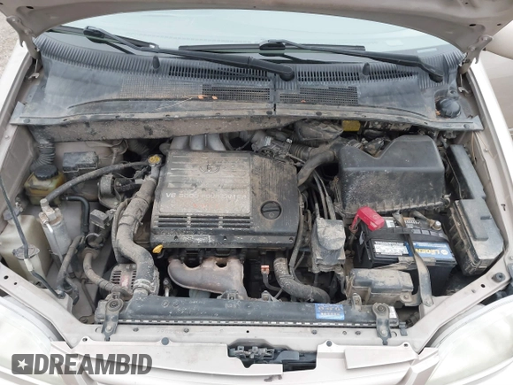 2002 Toyota Sienna LE with VIN 4T3ZF13C42U418853, listed as a IAAI auction lot 41248253 with 193,986 mi miles. Bid and sale history available at carsss.com. Image 9.