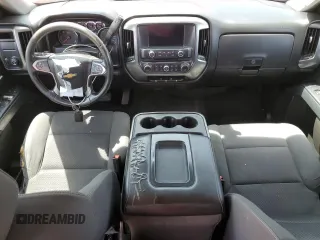 2016 Chevrolet Silverado 1500 LT with VIN 1GCRCREC0GZ197425, listed as a Copart auction lot 65031304 with 122,605 mi miles and Salvage Title. Bid and sale history available at DreamBid. Image 8.