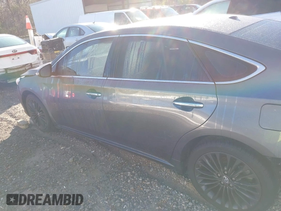 2016 Toyota Avalon Limited with VIN 4T1BK1EBXGU205973, listed as a IAAI auction lot 41206815 with 64,169 mi miles and . Bid and sale history available at DreamBid. Image 14.
