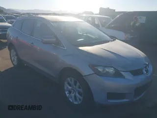2009 Mazda CX-7 Sport with VIN JM3ER293190233927, listed as a IAAI auction lot 41054654 with 103,137 mi miles. Bid and sale history available at carsss.com. Image 1.