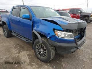 2019 Chevrolet Colorado 4WD ZR2 with VIN 1GCGTEEN7K1310876, listed as a IAAI auction lot 41848303 with 74,466 mi miles and . Bid and sale history available at DreamBid. Image 1.