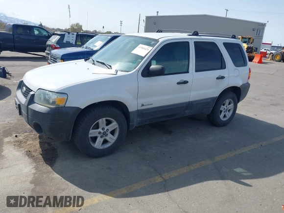 2006 Ford Escape Hybrid with VIN 1FMYU96H96KD56271, listed as a IAAI auction lot 41981621 with 156,825 mi miles and . Bid and sale history available at DreamBid. Image 2.