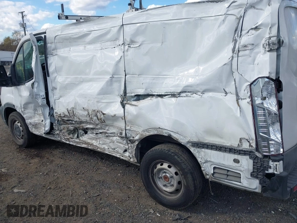 2022 Ford Transit Cargo with VIN 1FTBR1YG6NKA84259, listed as a IAAI auction lot 40764177 with 80,042 mi miles and . Bid and sale history available at DreamBid. Image 6.