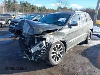 2017 Jeep Grand Cherokee Overland with VIN 1C4RJFCG8HC835645, listed as a IAAI auction lot 41442765 with 95,324 mi miles and . Bid and sale history available at DreamBid. Image 18.