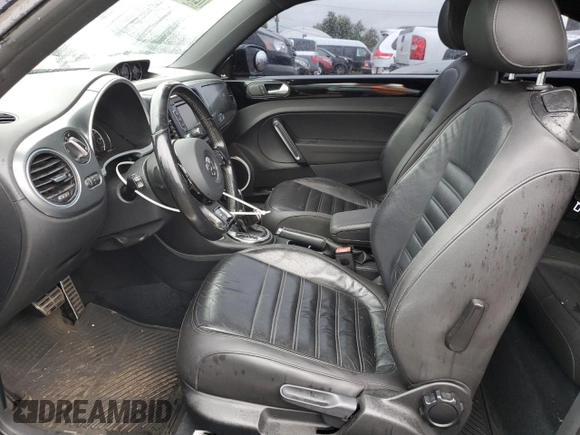 2014 Volkswagen Beetle Turbo R-Line with VIN 3VWVT7AT2EM603435, listed as a Copart auction lot 72755524 with 99,300 mi miles and Salvage Title. Bid and sale history available at DreamBid. Image 7.