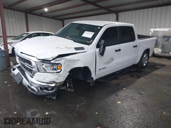 2023 Ram 1500 Big Horn z VIN 1C6RRFFG7PN698664, wystawiony jako IAAI lot #41103495 z przebiegiem 34 307 mil mil oraz . Historia ofert i sprzedaży dostępna na DreamBid. Obrazek 2.