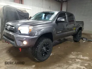 2014 Toyota Tacoma with VIN 5TFLU4ENXEX089927, listed as a Copart auction lot 52140565 with 112,924 mi miles and Salvage Title. Bid and sale history available at DreamBid. Image 1.