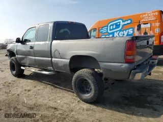 2001 Chevrolet Silverado 1500 LS with VIN 2GCEC19T611245018, listed as a Copart auction lot 82879514 with 0 mi miles and Salvage Title. Bid and sale history available at carsss.com. Image 2.