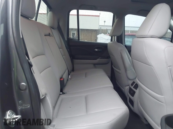 2018 Honda Ridgeline RTL-E with VIN 5FPYK3F74JB012181, listed as a IAAI auction lot 42143197 with 117,520 mi miles and . Bid and sale history available at DreamBid. Image 8.