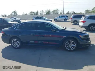 2020 Volkswagen Passat 2.0T SE with VIN 1VWSA7A33LC009556, listed as a IAAI auction lot 40989431 with 96,540 mi miles. Bid and sale history available at carsss.com. Image 12.