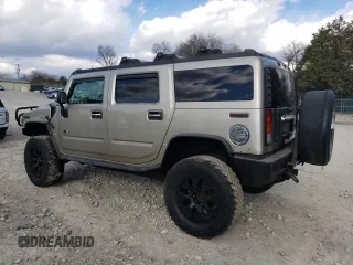 2003 Hummer H2 with VIN 5GRGN23U93H101021, listed as a Copart auction lot 87440524 with 124,826 mi miles and Clean Title. Bid and sale history available at carsss.com. Image 2.
