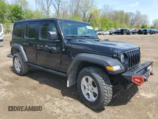 2023 Jeep Wrangler Sport S with VIN 1C4HJXDN9PW564543, listed as a Copart auction lot 56192945 with 42,015 mi miles and Salvage title. Bid and sale history available at DreamBid. Image 4.