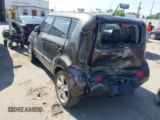 2011 Kia Soul + with VIN KNDJT2A28B7292286, listed as a IAAI auction lot 41999479 with 100,693 mi miles. Bid and sale history available at carsss.com. Image 3.