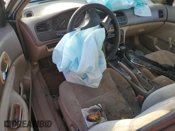 1997 Honda Accord Value with VIN 1HGCD5684VA168495, listed as a Copart auction lot 71716984 with 202,854 mi miles and Salvage Title. Bid and sale history available at DreamBid. Image 8.
