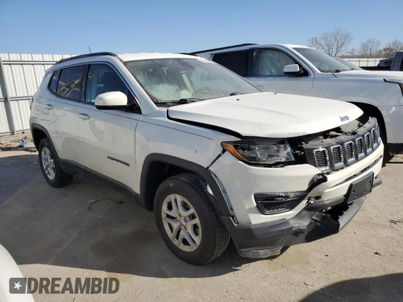 2020 Jeep Compass Sport with VIN 3C4NJDAB1LT132704, listed as a Copart auction lot 48259785 with 68,669 mi miles and Salvage Title. Bid and sale history available at DreamBid. Image 4.