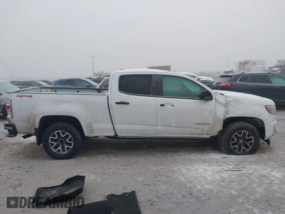 2018 Chevrolet Colorado 4WD Work Truck z VIN 1GCGTBEN3J1271023, wystawiony jako IAAI lot #41013812 z przebiegiem 124 032 mil mil oraz . Historia ofert i sprzedaży dostępna na DreamBid. Obrazek 14.