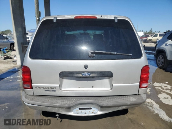 2003 Ford Explorer Sport XLS z VIN 1FMYU60E43UB05641, wystawiony jako Copart lot #87804375 z przebiegiem 130 434 mil mil oraz Szkody całkowita. Historia ofert i sprzedaży dostępna na DreamBid. Obrazek 6.