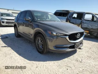 2017 Mazda CX-5 Touring with VIN JM3KFACL1H0100436, listed as a Copart auction lot 53058875 with 77,205 mi miles and Salvage Title. Bid and sale history available at DreamBid. Image 4.